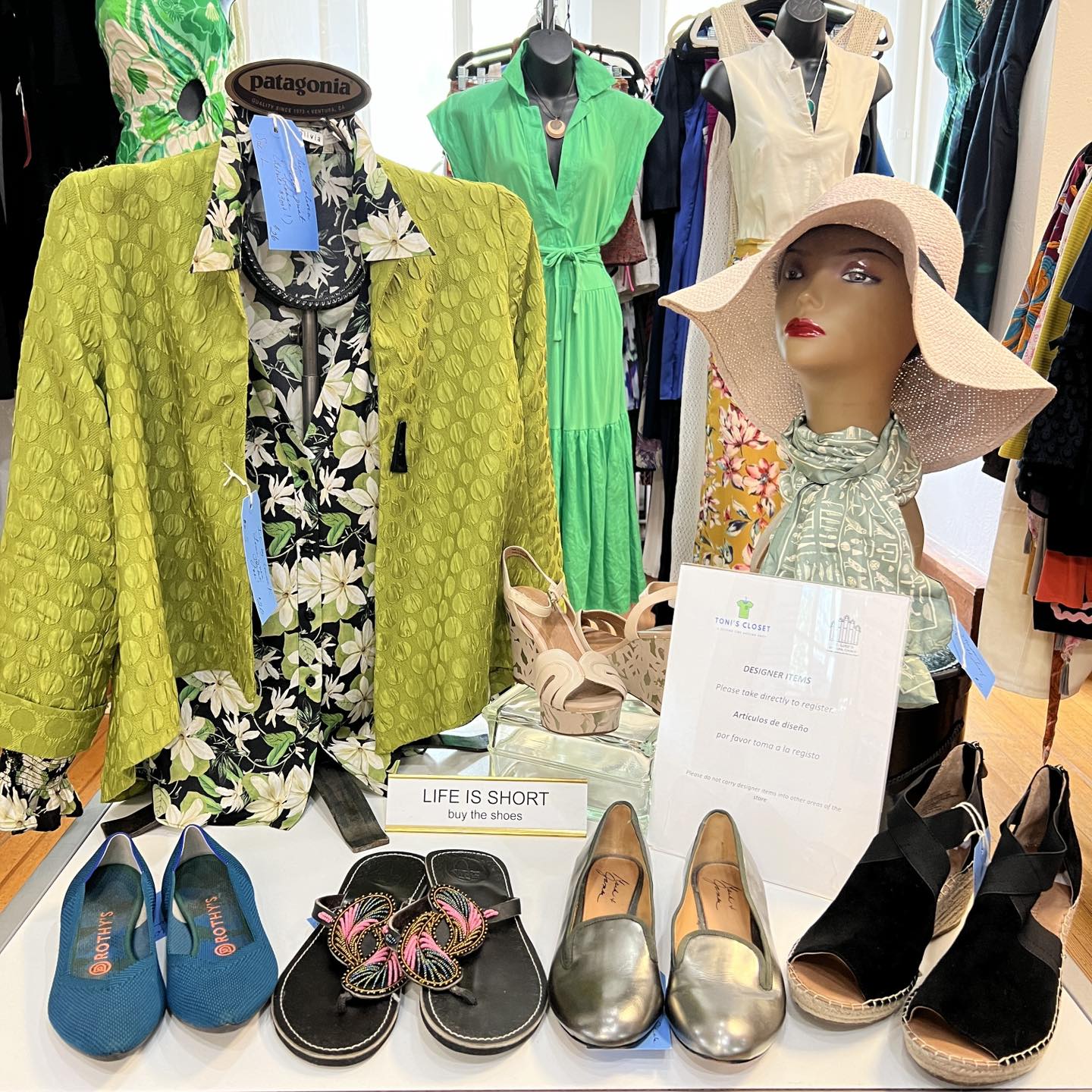 Dresses and shoes on display at Toni's Closet